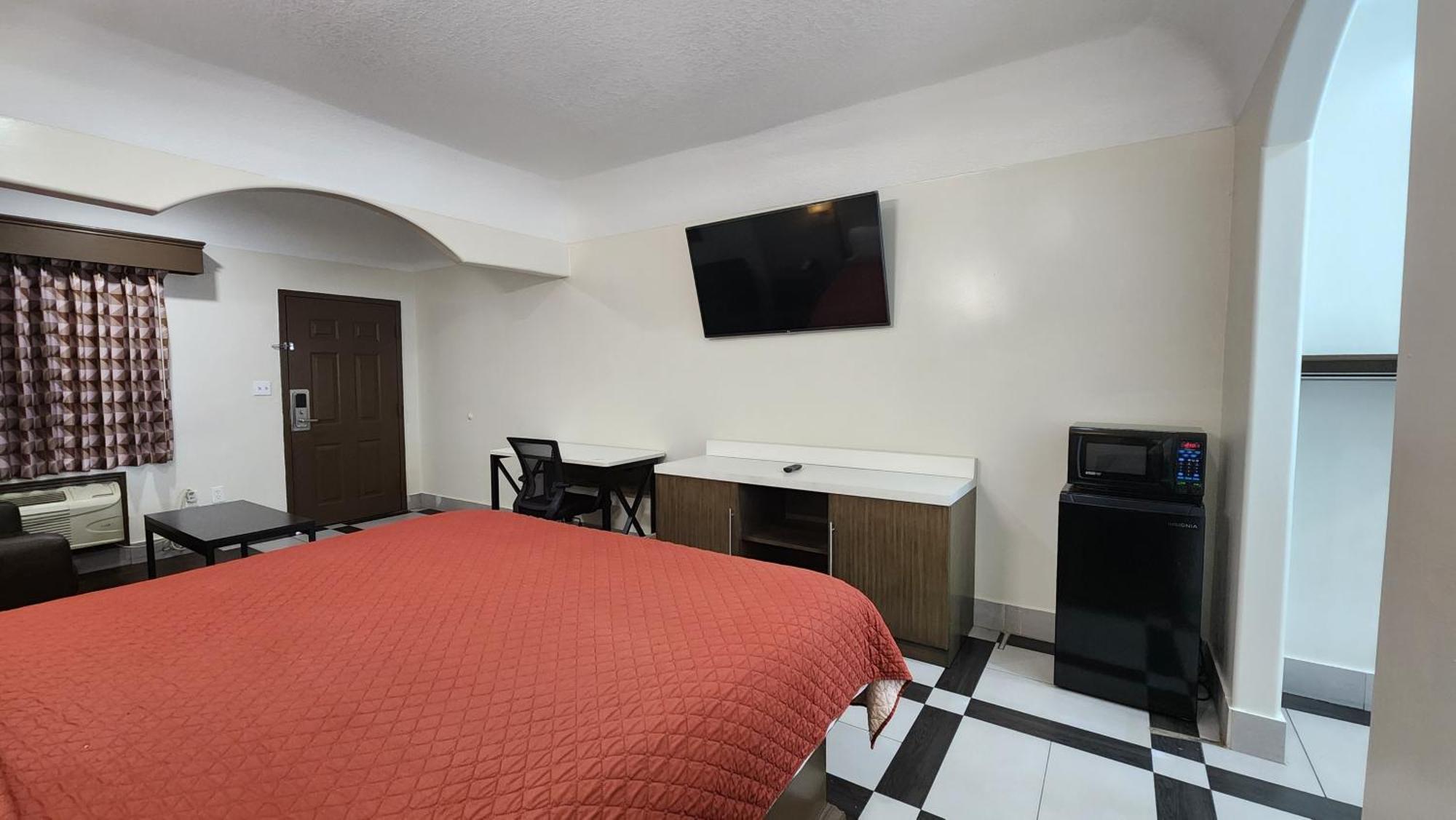 Scottish Inn & Suites Sam Houston Parkway Екстер'єр фото