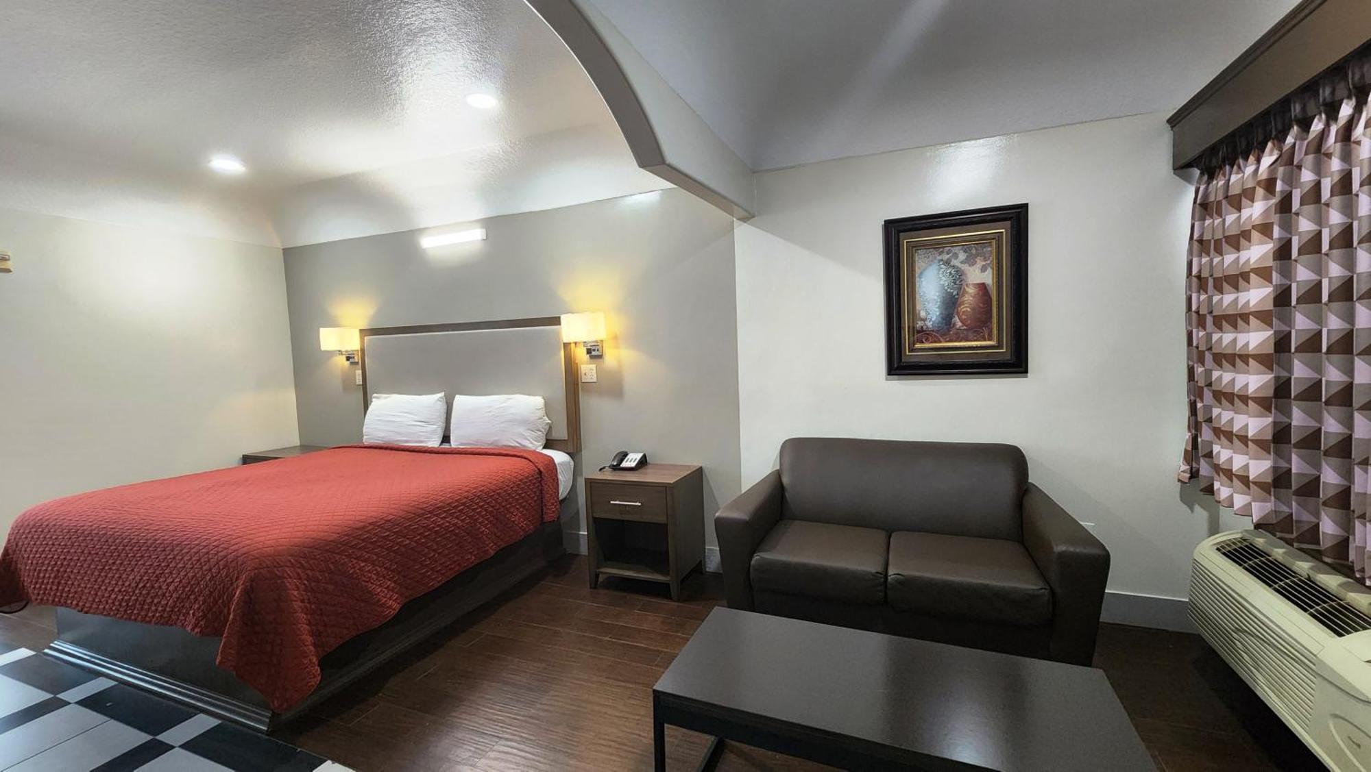 Scottish Inn & Suites Sam Houston Parkway Екстер'єр фото