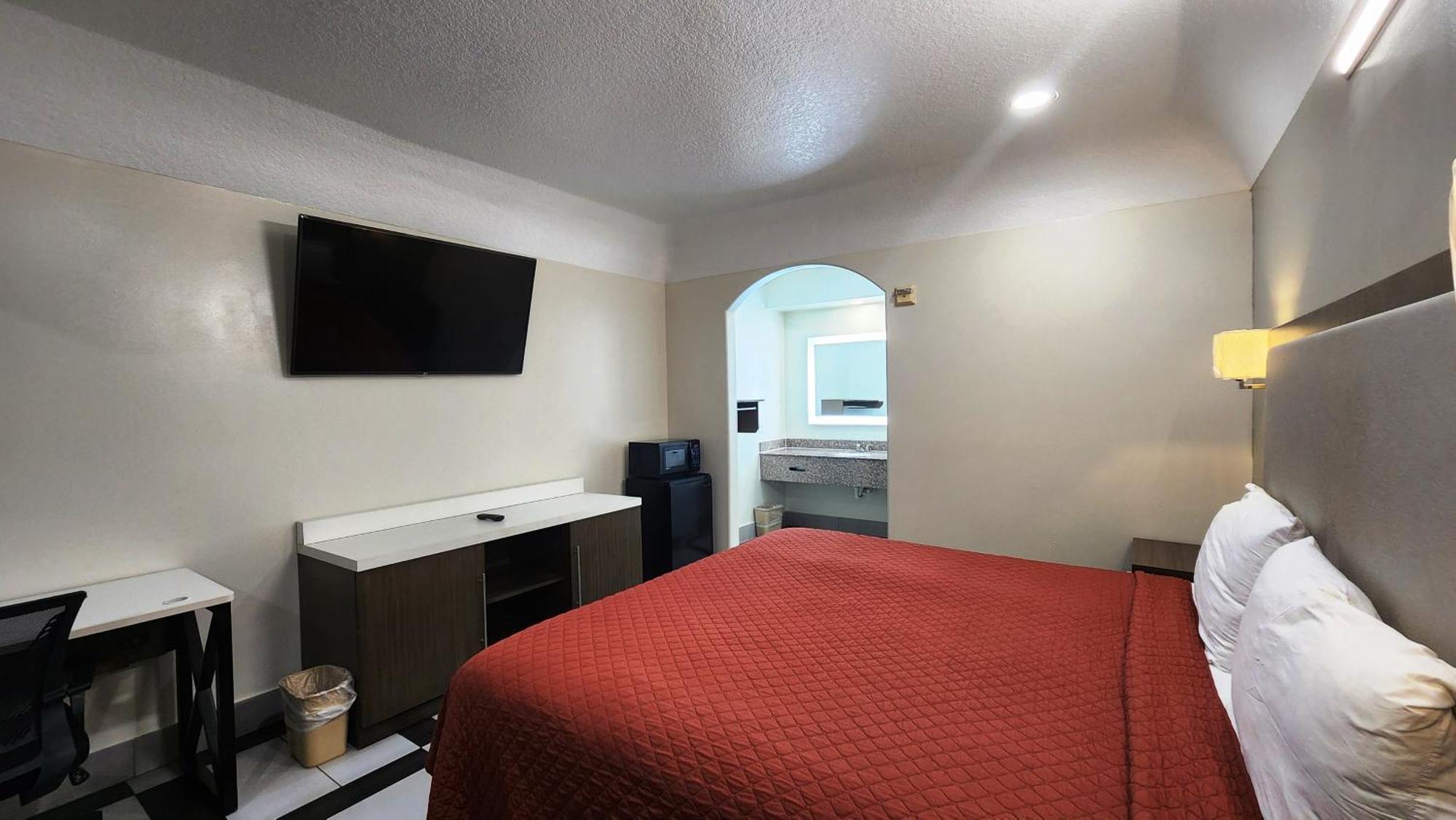 Scottish Inn & Suites Sam Houston Parkway Екстер'єр фото