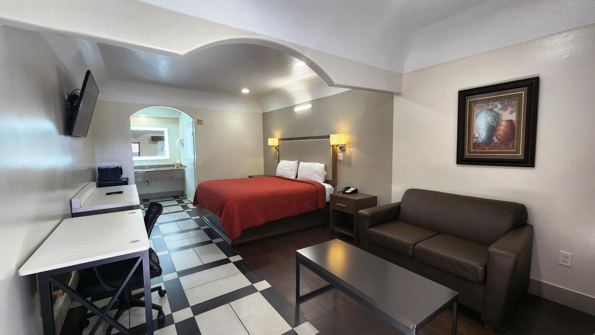 Scottish Inn & Suites Sam Houston Parkway Екстер'єр фото