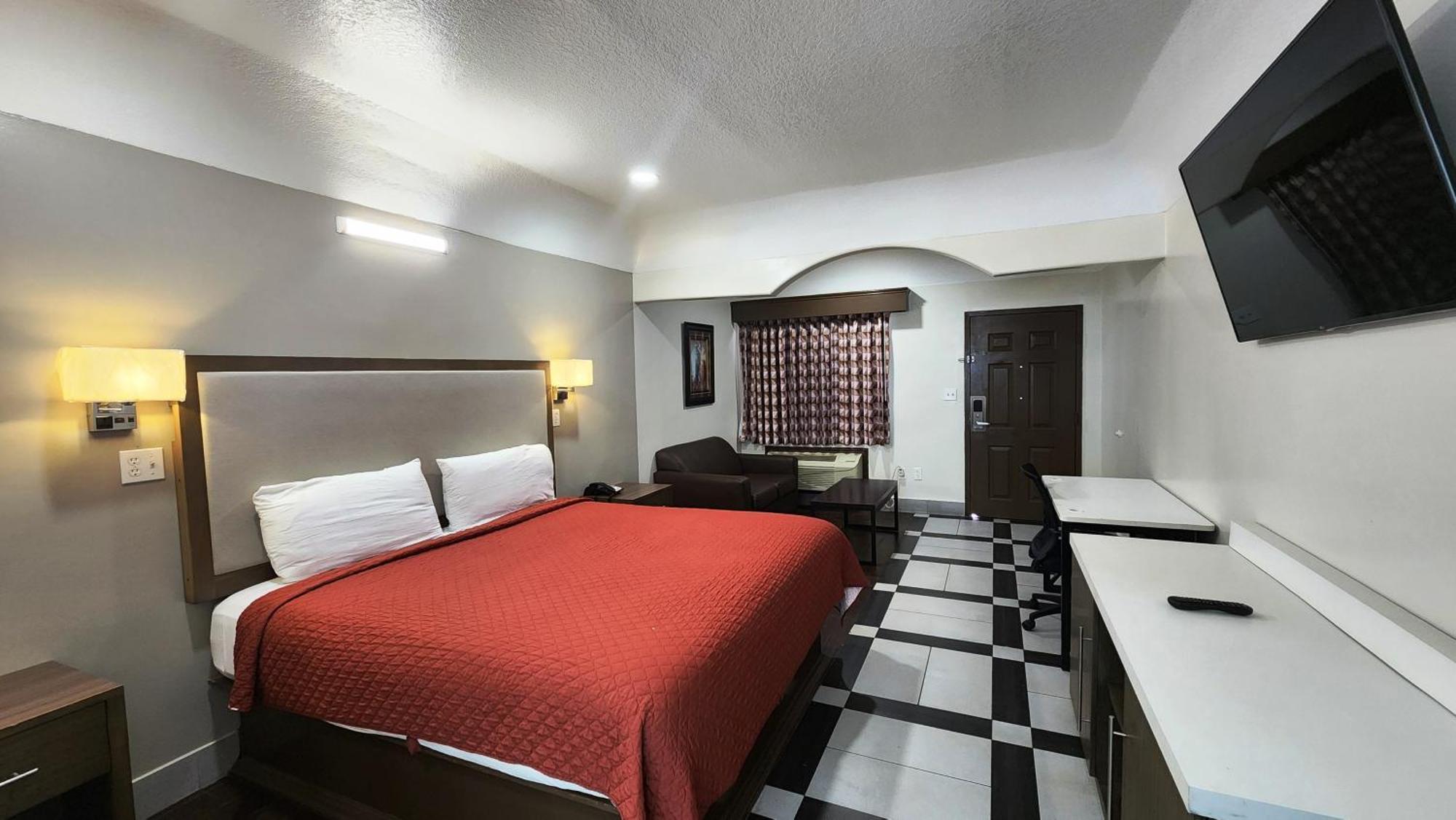 Scottish Inn & Suites Sam Houston Parkway Екстер'єр фото